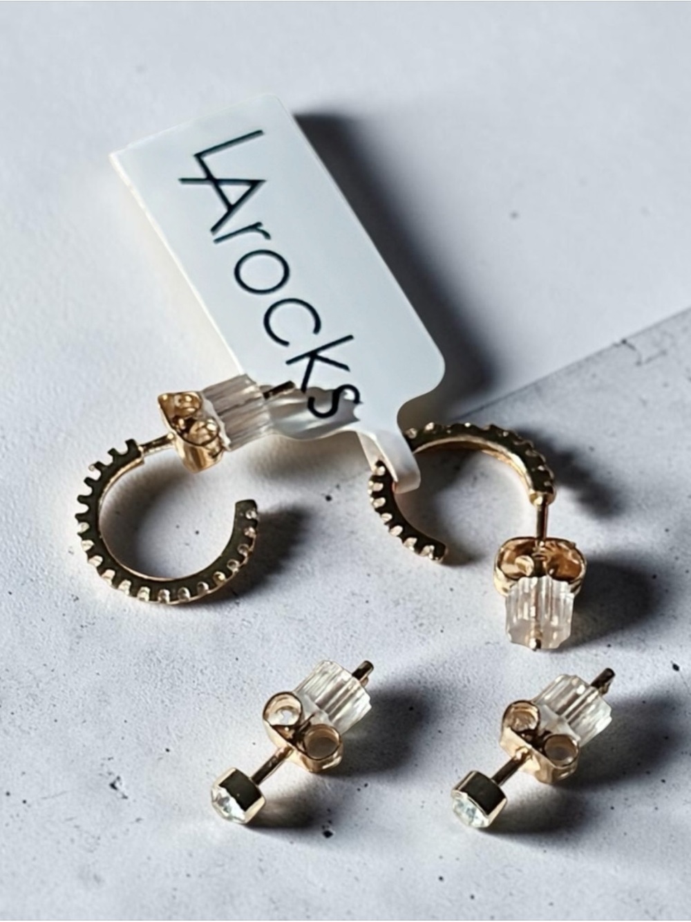 LArocks hoop and studs earring set.